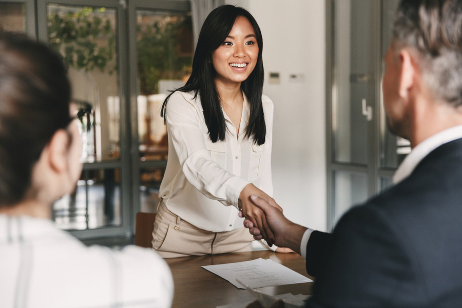 applicant shaking hands with the interviewer