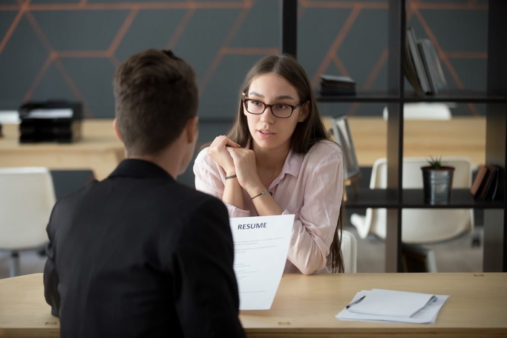 recruiter interviewing an applicant