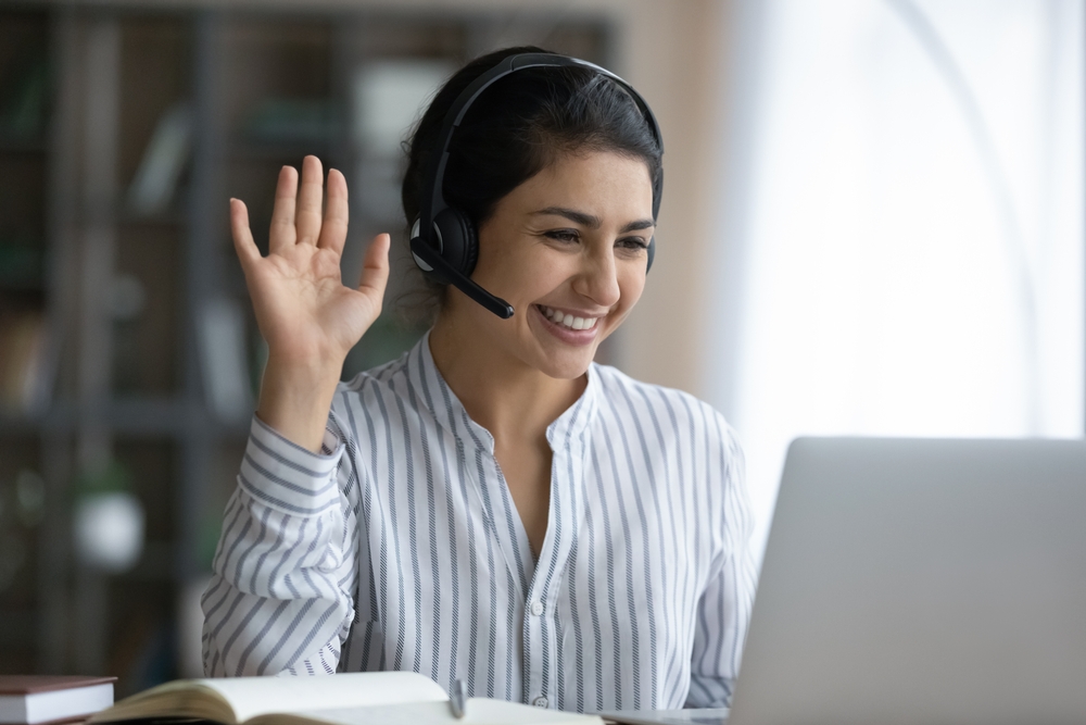 female recruiter welcoming someone on video call