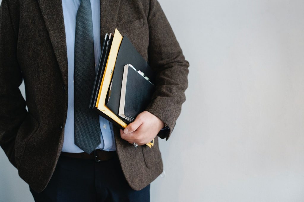 a person carrying documents