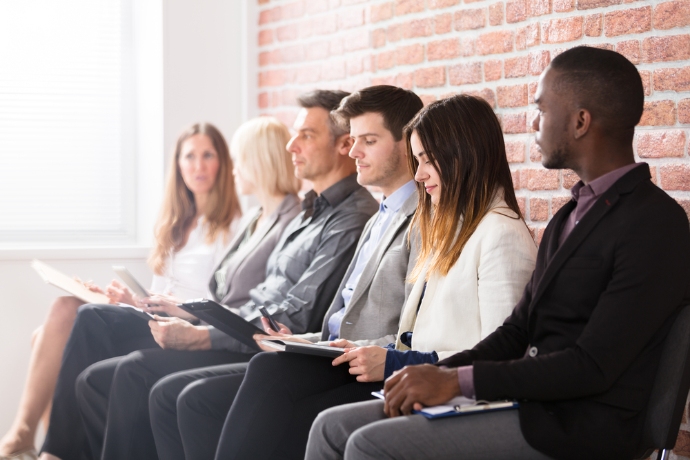 Group Of Diverse People Waiting For Job Interview In Office