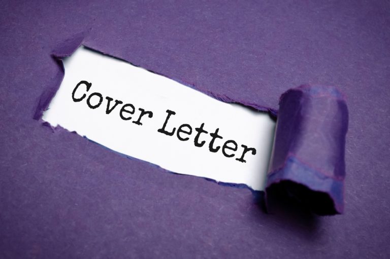 Cover letter text concept on torn purple paper