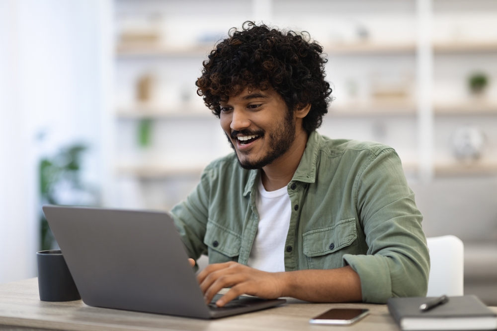 male freelancer enjoying his job