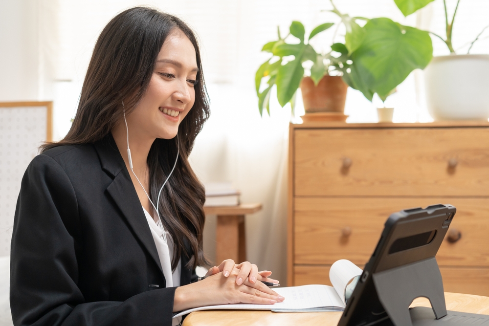 female recruiter conducting an interview on a tablet