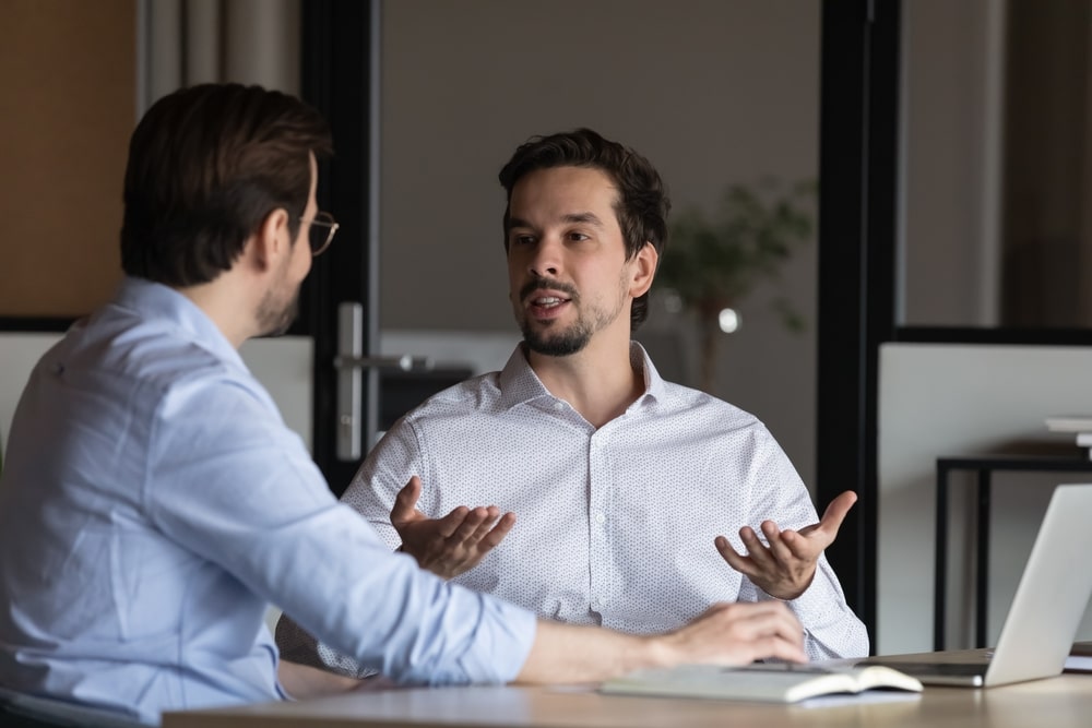 employer talking to employee about long-term goals