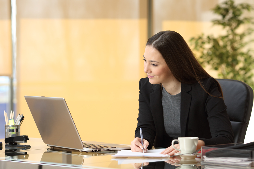 a recruiter looking at her laptop