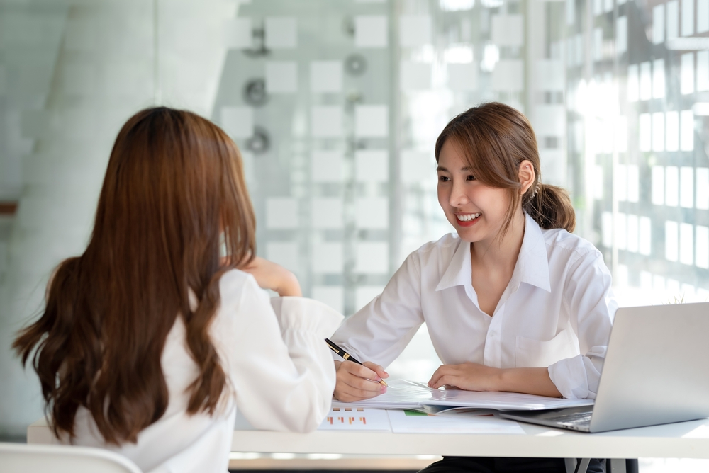 a recruitment officer talking to an applicant