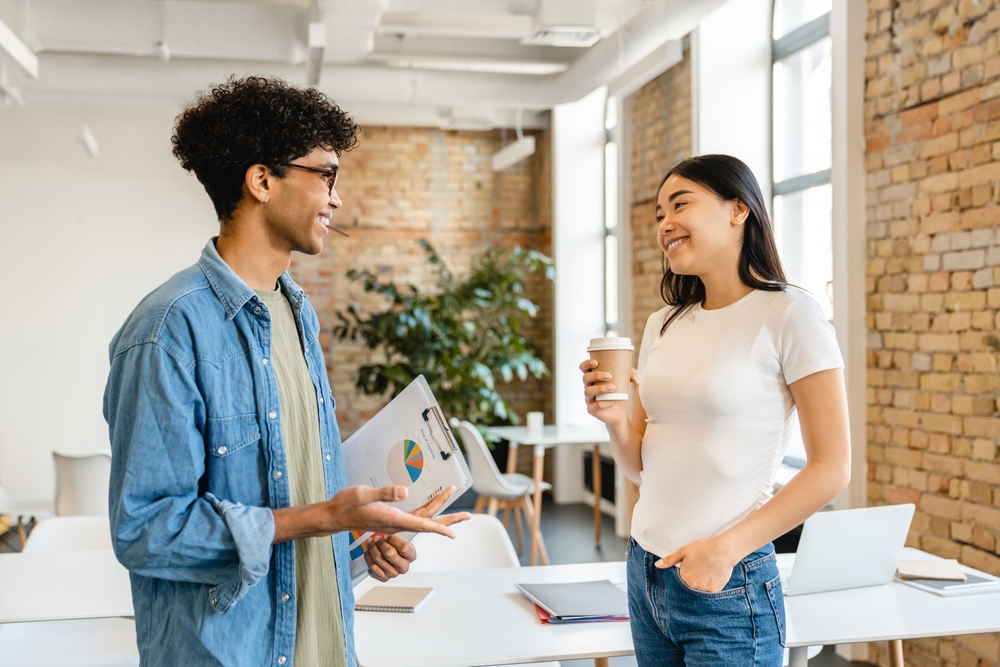 two employees talking